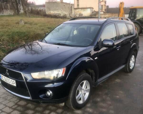 Синий Мицубиси Аутлендер, объемом двигателя 2 л и пробегом 235 тыс. км за 8800 $, фото 7 на Automoto.ua