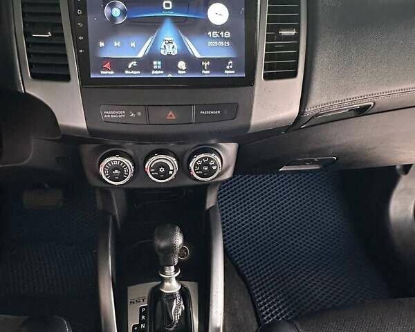 Синій Міцубісі Аутлендер, об'ємом двигуна 2.18 л та пробігом 257 тис. км за 12100 $, фото 29 на Automoto.ua