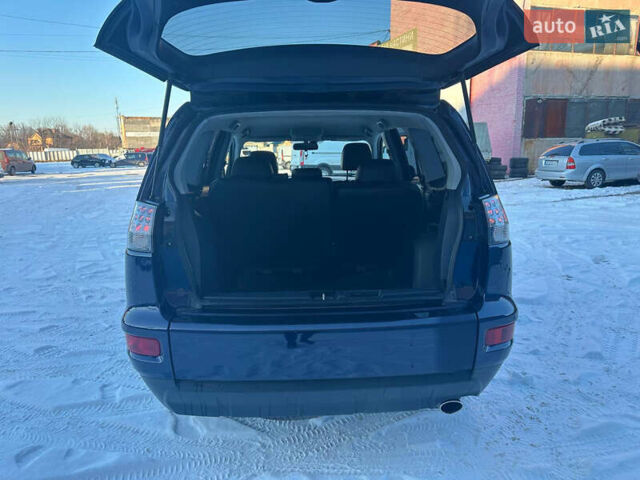 Синий Мицубиси Аутлендер, объемом двигателя 2 л и пробегом 252 тыс. км за 11500 $, фото 20 на Automoto.ua