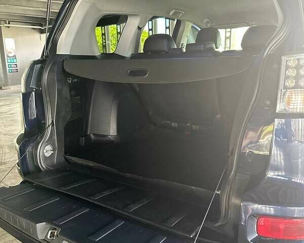 Синій Міцубісі Аутлендер, об'ємом двигуна 2.18 л та пробігом 257 тис. км за 12100 $, фото 25 на Automoto.ua