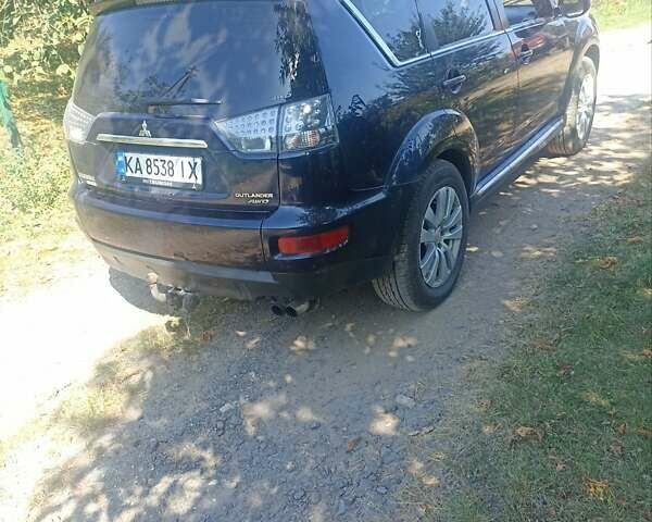 Синий Мицубиси Аутлендер, объемом двигателя 2.18 л и пробегом 223 тыс. км за 11200 $, фото 9 на Automoto.ua