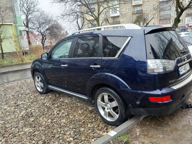 Синий Мицубиси Аутлендер, объемом двигателя 2.2 л и пробегом 220 тыс. км за 11450 $, фото 3 на Automoto.ua