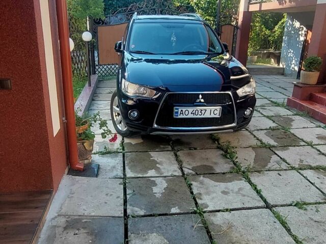 Синий Мицубиси Аутлендер, объемом двигателя 2.2 л и пробегом 295 тыс. км за 10900 $, фото 4 на Automoto.ua