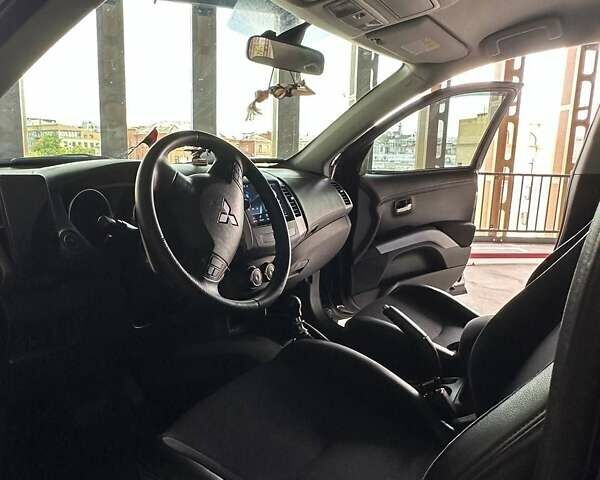 Мицубиси Аутлендер 2010 в Харькове на Automoto.ua Синий Мицубиси Аутлендер, объемом двигателя 2.2 л и пробегом 260 тыс. км за 11100 $, фото 13 на Automoto.ua