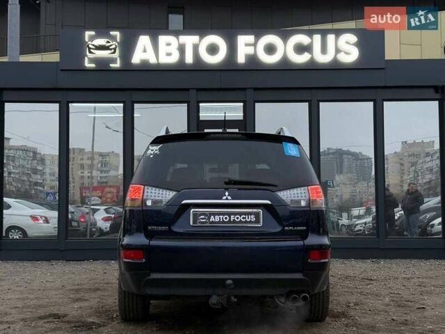 Синий Мицубиси Аутлендер, объемом двигателя 2.18 л и пробегом 289 тыс. км за 9990 $, фото 6 на Automoto.ua