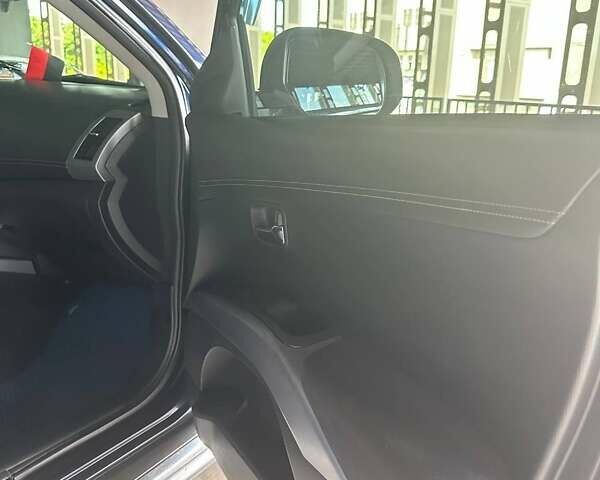 Синій Міцубісі Аутлендер, об'ємом двигуна 2.18 л та пробігом 257 тис. км за 12100 $, фото 16 на Automoto.ua