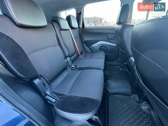 Синий Мицубиси Аутлендер, объемом двигателя 2 л и пробегом 257 тыс. км за 10500 $, фото 17 на Automoto.ua