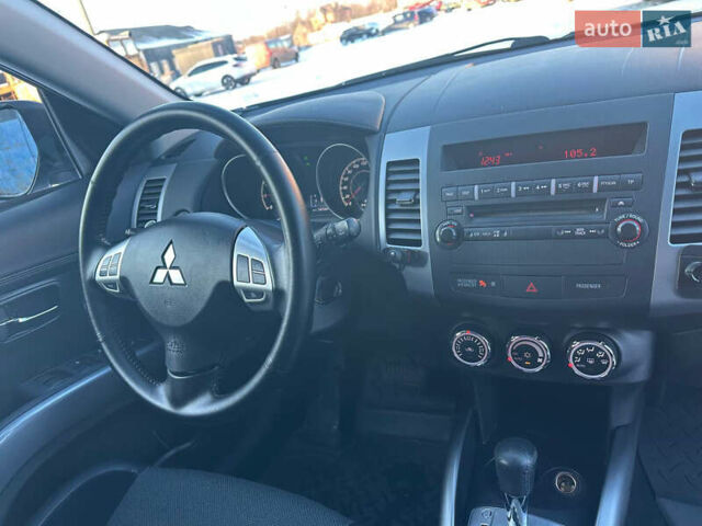 Синий Мицубиси Аутлендер, объемом двигателя 2 л и пробегом 257 тыс. км за 10500 $, фото 15 на Automoto.ua