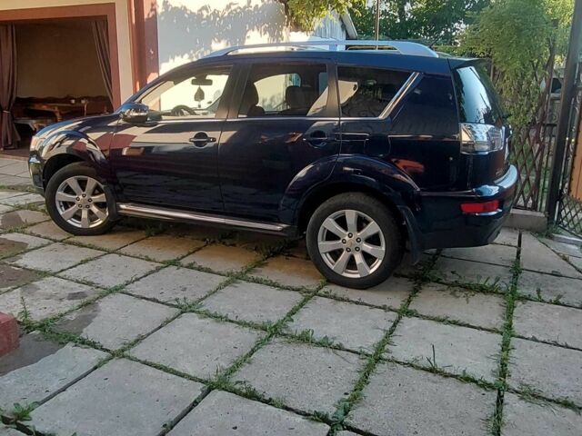 Синий Мицубиси Аутлендер, объемом двигателя 2.2 л и пробегом 295 тыс. км за 10900 $, фото 5 на Automoto.ua