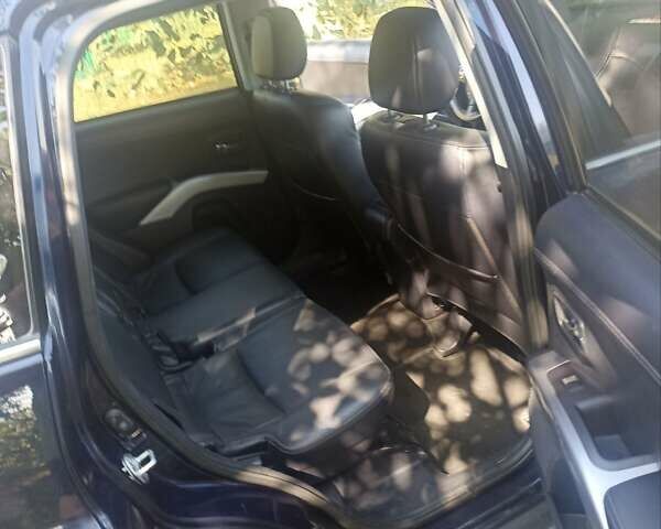 Синий Мицубиси Аутлендер, объемом двигателя 2.18 л и пробегом 223 тыс. км за 11200 $, фото 4 на Automoto.ua