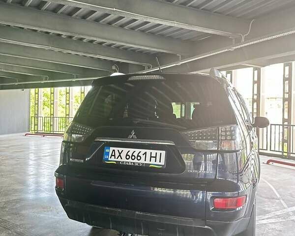 Синій Міцубісі Аутлендер, об'ємом двигуна 2.18 л та пробігом 257 тис. км за 12100 $, фото 11 на Automoto.ua