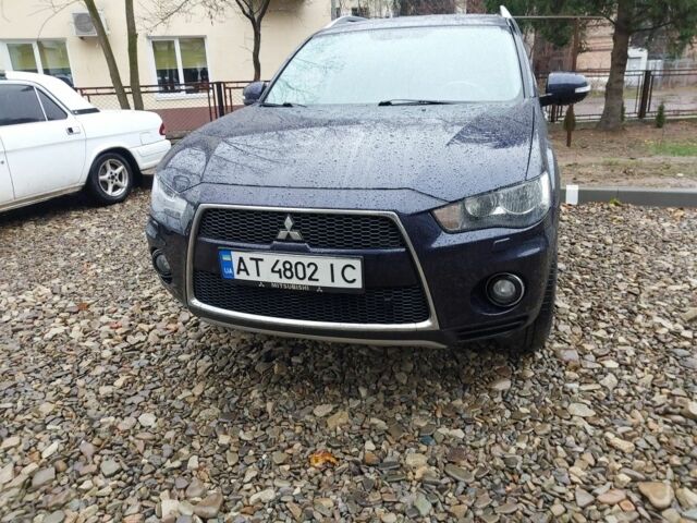 Синий Мицубиси Аутлендер, объемом двигателя 2.2 л и пробегом 220 тыс. км за 11450 $, фото 1 на Automoto.ua