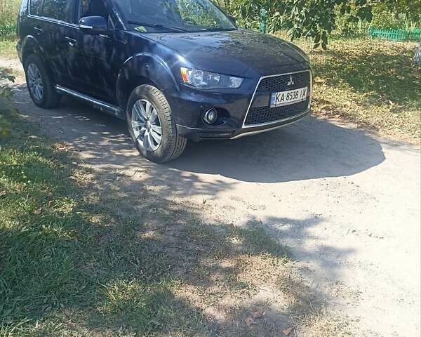 Синий Мицубиси Аутлендер, объемом двигателя 2.18 л и пробегом 223 тыс. км за 11200 $, фото 3 на Automoto.ua