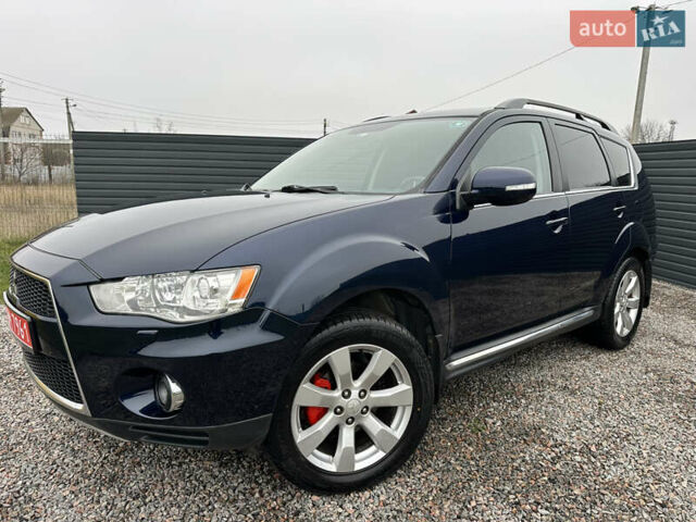 Синий Мицубиси Аутлендер, объемом двигателя 2.3 л и пробегом 202 тыс. км за 11650 $, фото 4 на Automoto.ua