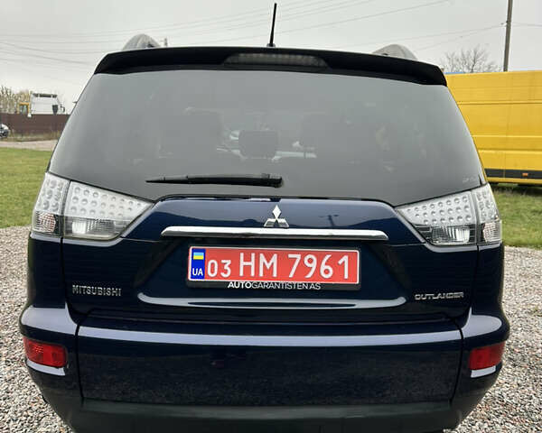 Синий Мицубиси Аутлендер, объемом двигателя 2.3 л и пробегом 202 тыс. км за 11650 $, фото 10 на Automoto.ua