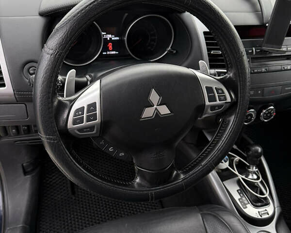 Синий Мицубиси Аутлендер, объемом двигателя 2.2 л и пробегом 213 тыс. км за 12000 $, фото 15 на Automoto.ua