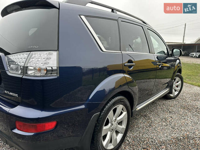 Синий Мицубиси Аутлендер, объемом двигателя 2.3 л и пробегом 202 тыс. км за 11650 $, фото 11 на Automoto.ua