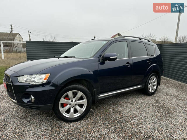 Синий Мицубиси Аутлендер, объемом двигателя 2.3 л и пробегом 202 тыс. км за 11650 $, фото 3 на Automoto.ua