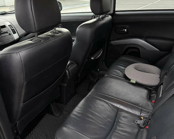 Синий Мицубиси Аутлендер, объемом двигателя 2.2 л и пробегом 213 тыс. км за 12000 $, фото 16 на Automoto.ua