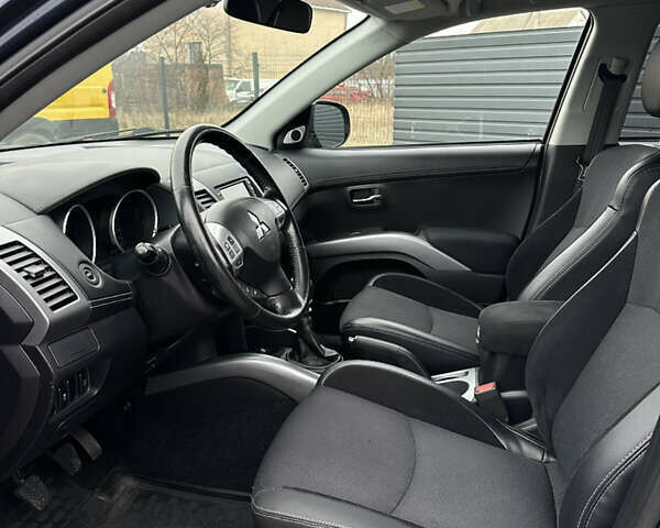 Синий Мицубиси Аутлендер, объемом двигателя 2.3 л и пробегом 202 тыс. км за 11650 $, фото 14 на Automoto.ua