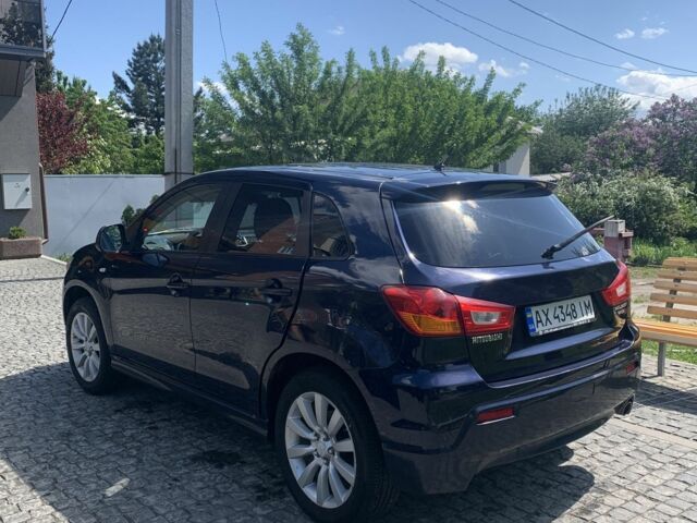 Синий Мицубиси Аутлендер, объемом двигателя 2 л и пробегом 185 тыс. км за 9000 $, фото 3 на Automoto.ua