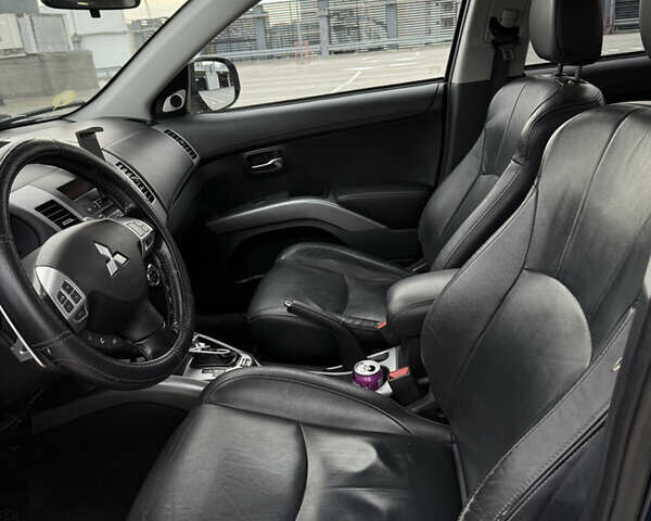 Синий Мицубиси Аутлендер, объемом двигателя 2.2 л и пробегом 213 тыс. км за 12000 $, фото 17 на Automoto.ua