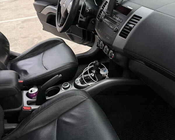 Синий Мицубиси Аутлендер, объемом двигателя 2.2 л и пробегом 213 тыс. км за 12000 $, фото 12 на Automoto.ua