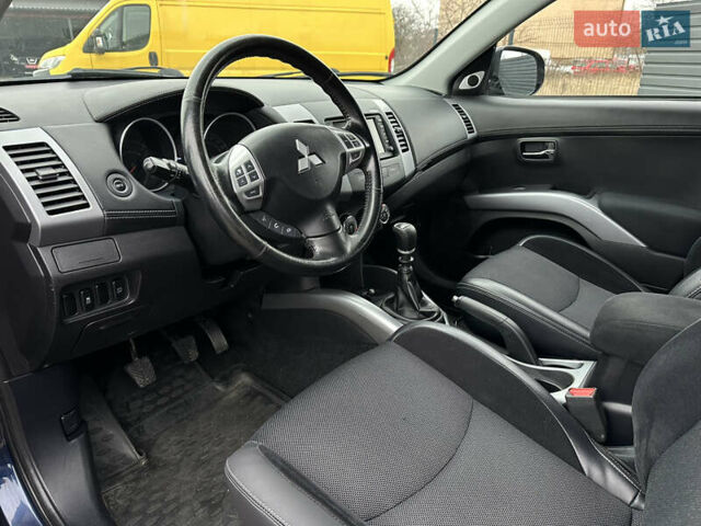 Синий Мицубиси Аутлендер, объемом двигателя 2.3 л и пробегом 202 тыс. км за 11650 $, фото 15 на Automoto.ua