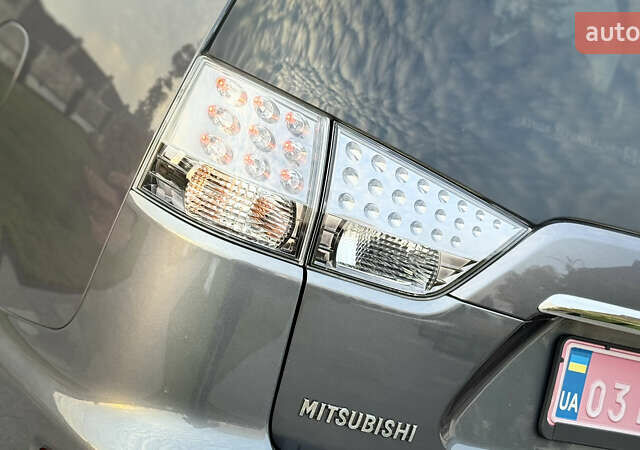 Синій Міцубісі Аутлендер, об'ємом двигуна 2.2 л та пробігом 270 тис. км за 10888 $, фото 18 на Automoto.ua