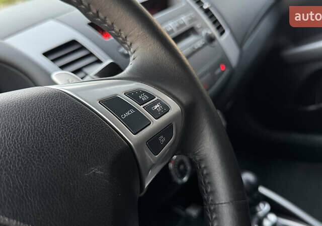 Синій Міцубісі Аутлендер, об'ємом двигуна 2.2 л та пробігом 270 тис. км за 10888 $, фото 57 на Automoto.ua