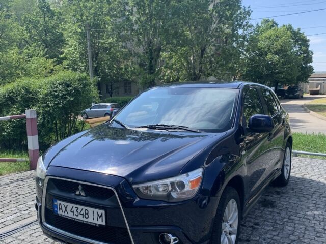 Синий Мицубиси Аутлендер, объемом двигателя 2 л и пробегом 185 тыс. км за 9000 $, фото 4 на Automoto.ua