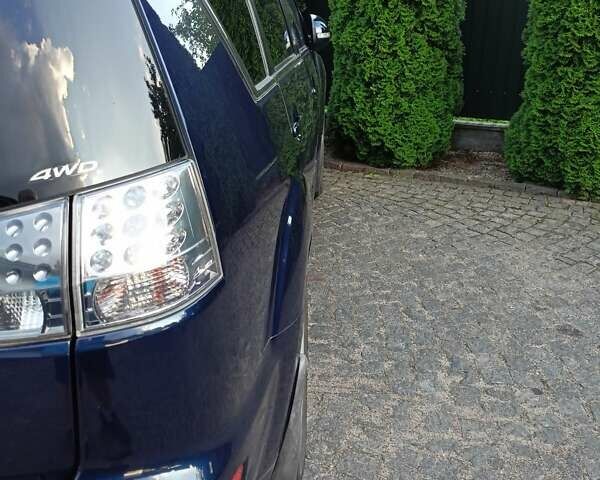 Синій Міцубісі Аутлендер, об'ємом двигуна 2.2 л та пробігом 208 тис. км за 11300 $, фото 5 на Automoto.ua