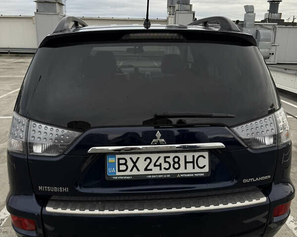 Синий Мицубиси Аутлендер, объемом двигателя 2.2 л и пробегом 213 тыс. км за 12000 $, фото 19 на Automoto.ua
