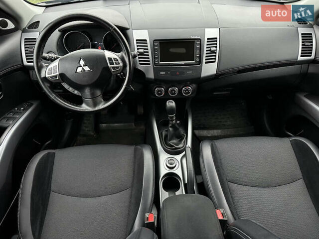 Синий Мицубиси Аутлендер, объемом двигателя 2.3 л и пробегом 202 тыс. км за 11650 $, фото 13 на Automoto.ua