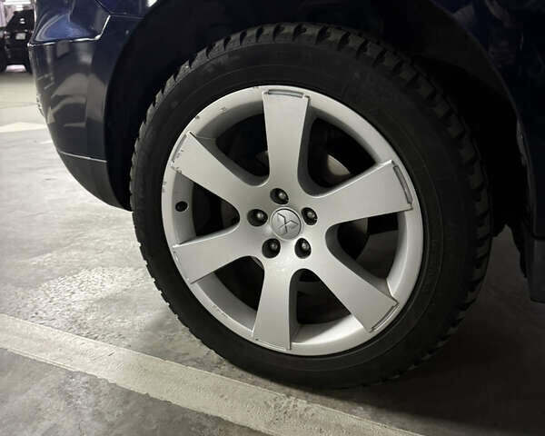 Синий Мицубиси Аутлендер, объемом двигателя 2.2 л и пробегом 213 тыс. км за 12000 $, фото 4 на Automoto.ua