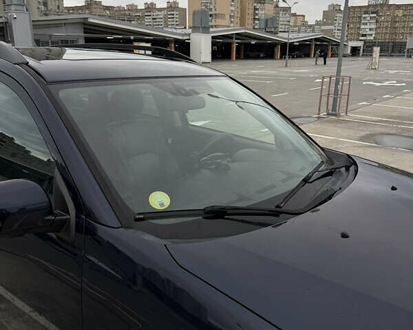 Синий Мицубиси Аутлендер, объемом двигателя 2.2 л и пробегом 213 тыс. км за 12000 $, фото 24 на Automoto.ua