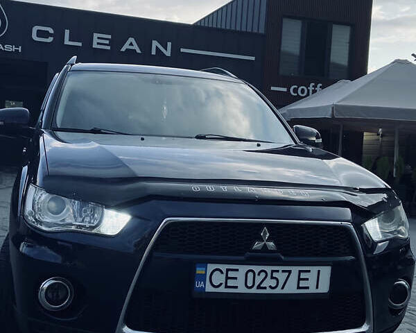 Синий Мицубиси Аутлендер, объемом двигателя 2.27 л и пробегом 262 тыс. км за 10900 $, фото 4 на Automoto.ua