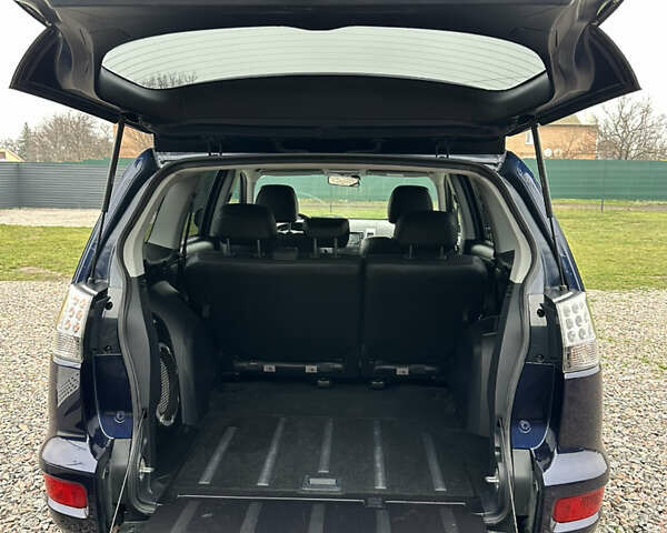 Синий Мицубиси Аутлендер, объемом двигателя 2.3 л и пробегом 202 тыс. км за 11650 $, фото 31 на Automoto.ua