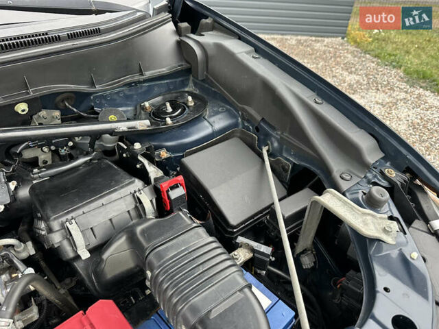 Синий Мицубиси Аутлендер, объемом двигателя 2.3 л и пробегом 202 тыс. км за 11650 $, фото 30 на Automoto.ua