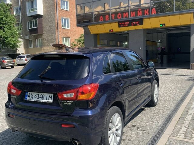 Синий Мицубиси Аутлендер, объемом двигателя 2 л и пробегом 185 тыс. км за 9000 $, фото 5 на Automoto.ua