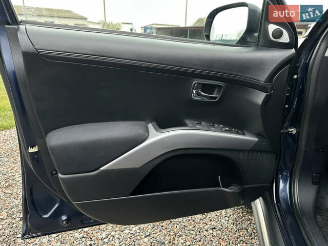 Синий Мицубиси Аутлендер, объемом двигателя 2.3 л и пробегом 202 тыс. км за 11650 $, фото 19 на Automoto.ua