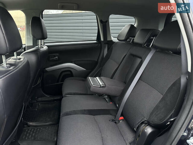 Синий Мицубиси Аутлендер, объемом двигателя 2.3 л и пробегом 202 тыс. км за 11650 $, фото 21 на Automoto.ua