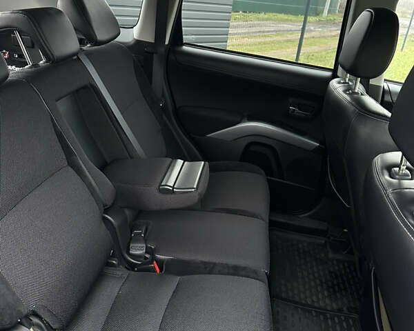 Синий Мицубиси Аутлендер, объемом двигателя 2.3 л и пробегом 202 тыс. км за 11650 $, фото 27 на Automoto.ua