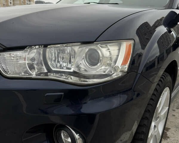 Синий Мицубиси Аутлендер, объемом двигателя 2.2 л и пробегом 213 тыс. км за 12000 $, фото 26 на Automoto.ua