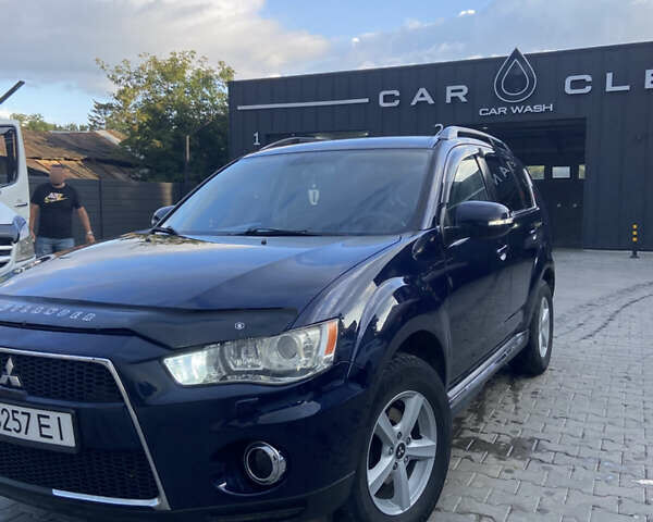 Синий Мицубиси Аутлендер, объемом двигателя 2.27 л и пробегом 262 тыс. км за 10900 $, фото 5 на Automoto.ua