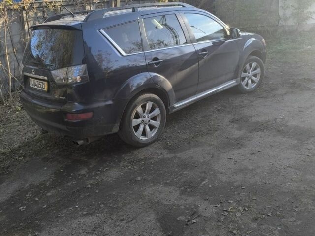 Синий Мицубиси Аутлендер, объемом двигателя 2.2 л и пробегом 284 тыс. км за 5700 $, фото 5 на Automoto.ua