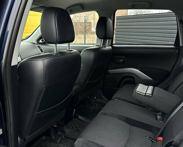 Синий Мицубиси Аутлендер, объемом двигателя 2.3 л и пробегом 202 тыс. км за 11650 $, фото 22 на Automoto.ua