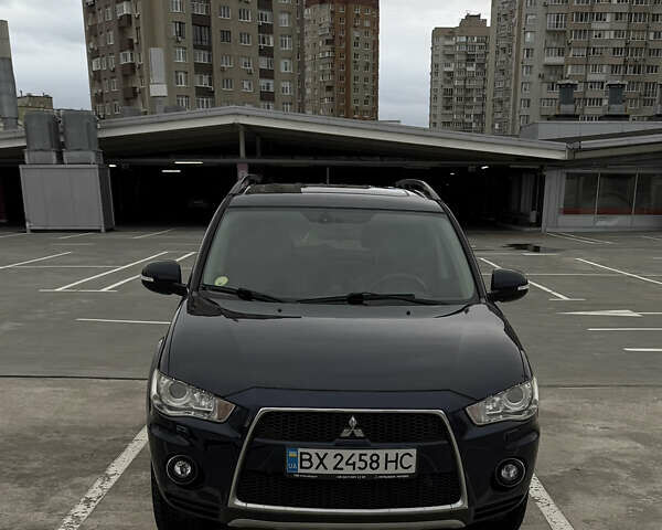 Синий Мицубиси Аутлендер, объемом двигателя 2.2 л и пробегом 213 тыс. км за 12000 $, фото 27 на Automoto.ua