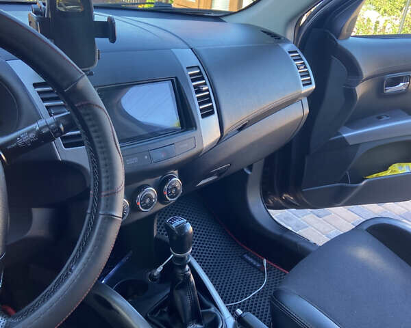 Синий Мицубиси Аутлендер, объемом двигателя 2.27 л и пробегом 262 тыс. км за 10900 $, фото 12 на Automoto.ua