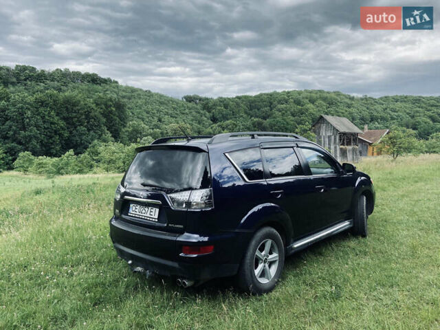 Синий Мицубиси Аутлендер, объемом двигателя 2.27 л и пробегом 262 тыс. км за 10900 $, фото 3 на Automoto.ua